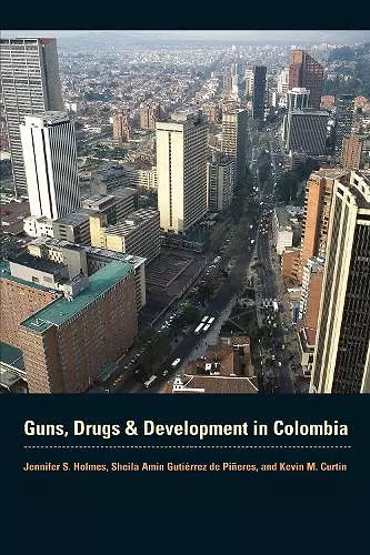 Guns, Drugs, and Development in Colombia cover