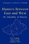 Hunters between East and West cover