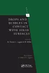 Drops and Bubbles in Contact with Solid Surfaces cover