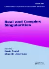 Real And Complex Singularities cover