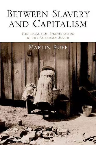 Between Slavery and Capitalism cover