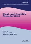 Real And Complex Singularities cover