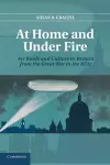 At Home and under Fire cover