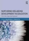 Nurturing Wellbeing Development in Education cover