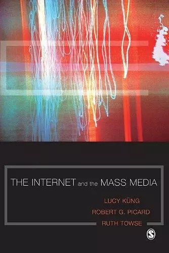 The Internet and the Mass Media cover