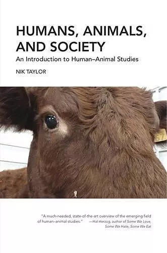 Humans, Animals, and Society cover