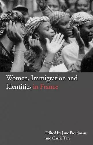 Women, Immigration and Identities in France cover