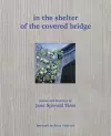 in the shelter of the covered bridge cover